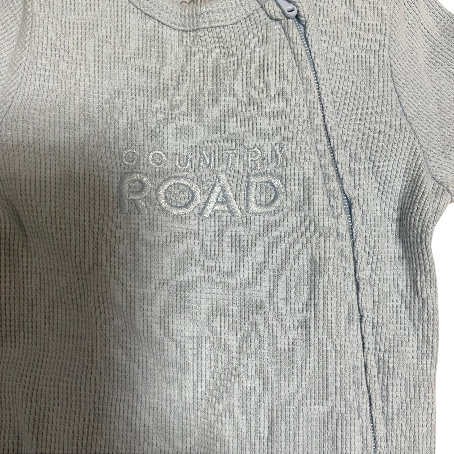 Amare Tutto light blue waffle knit Country Road baby one piece with a side zipper closure