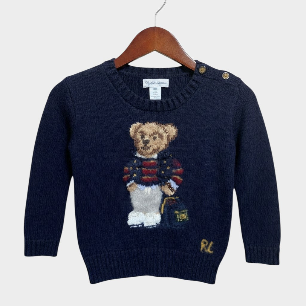 Amare Tutto navy blue knit sweater for toddlers featuring a Polo bear graphic and shoulder button detail.