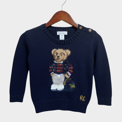Amare Tutto navy blue knit sweater for toddlers featuring a Polo bear graphic and shoulder button detail.
