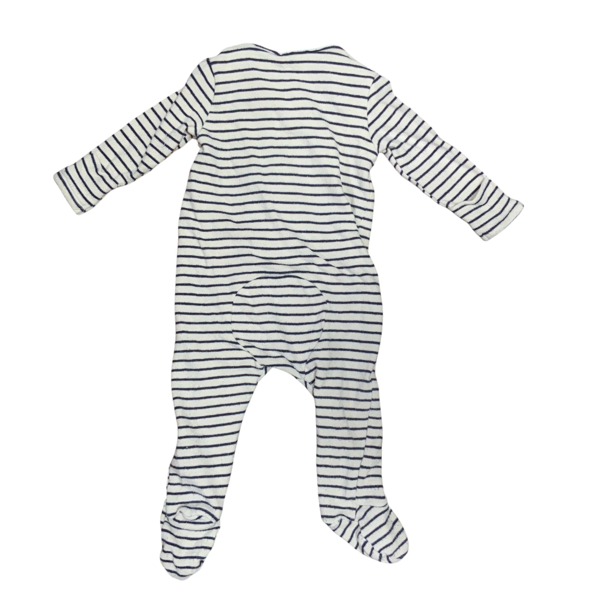 Amare Tutto baby one piece in white with navy blue horizontal stripes, featuring long sleeves and footed bottoms.
