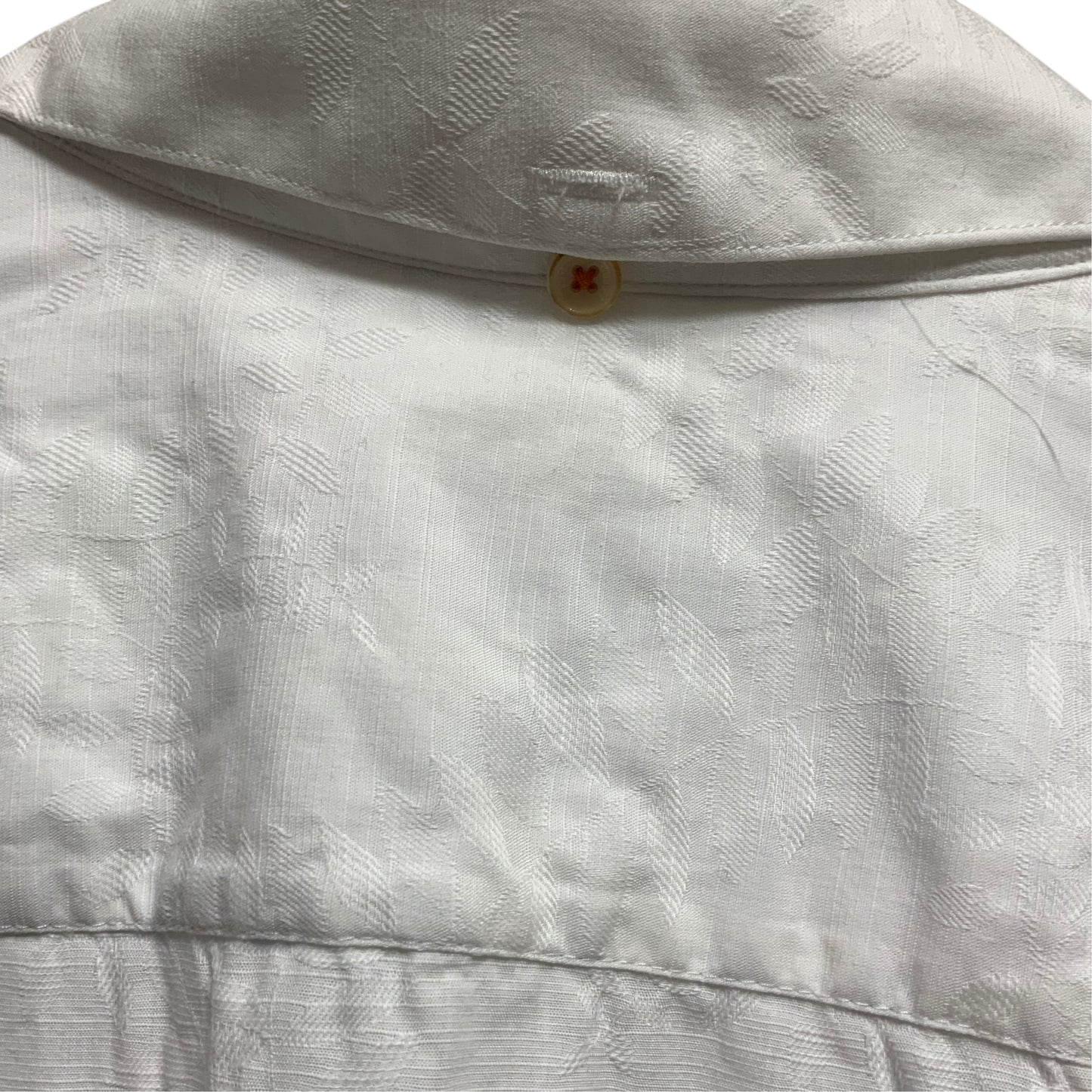 Amare Tutto Ted Baker London white cotton shirt featuring an embossed leaf pattern and contrast orange button stitching