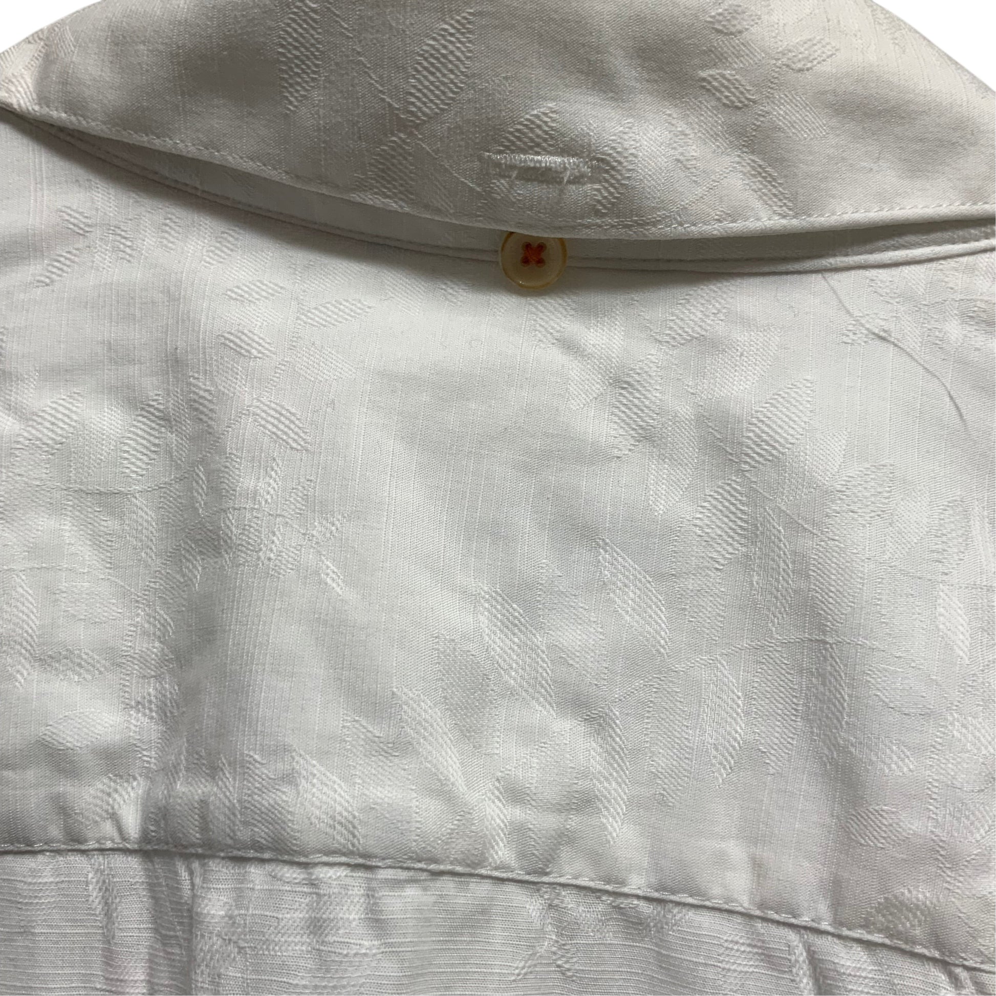 Amare Tutto Ted Baker London white cotton shirt featuring an embossed leaf pattern and contrast orange button stitching