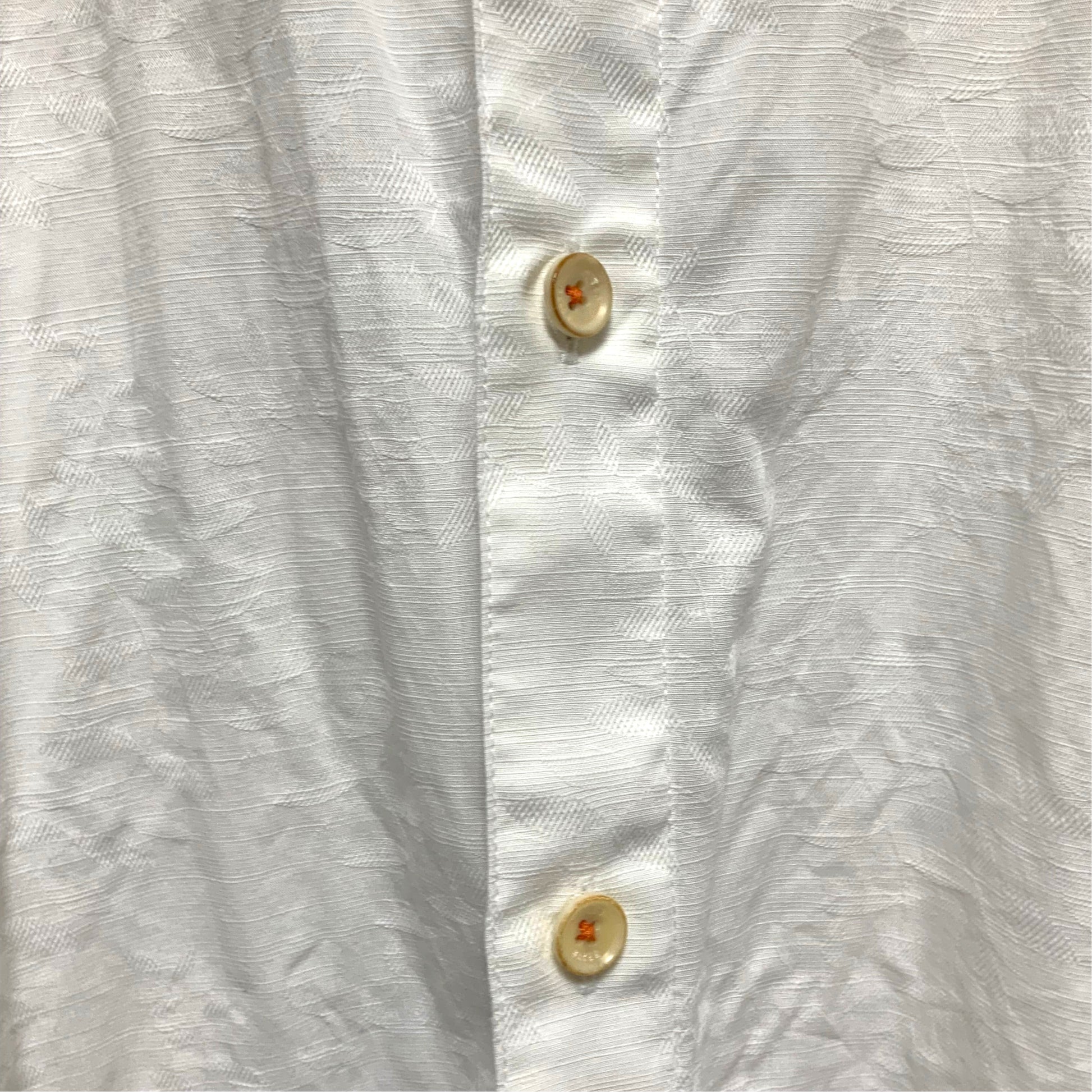 Amare Tutto Ted Baker London white cotton shirt featuring an embossed leaf pattern and contrast orange button stitching