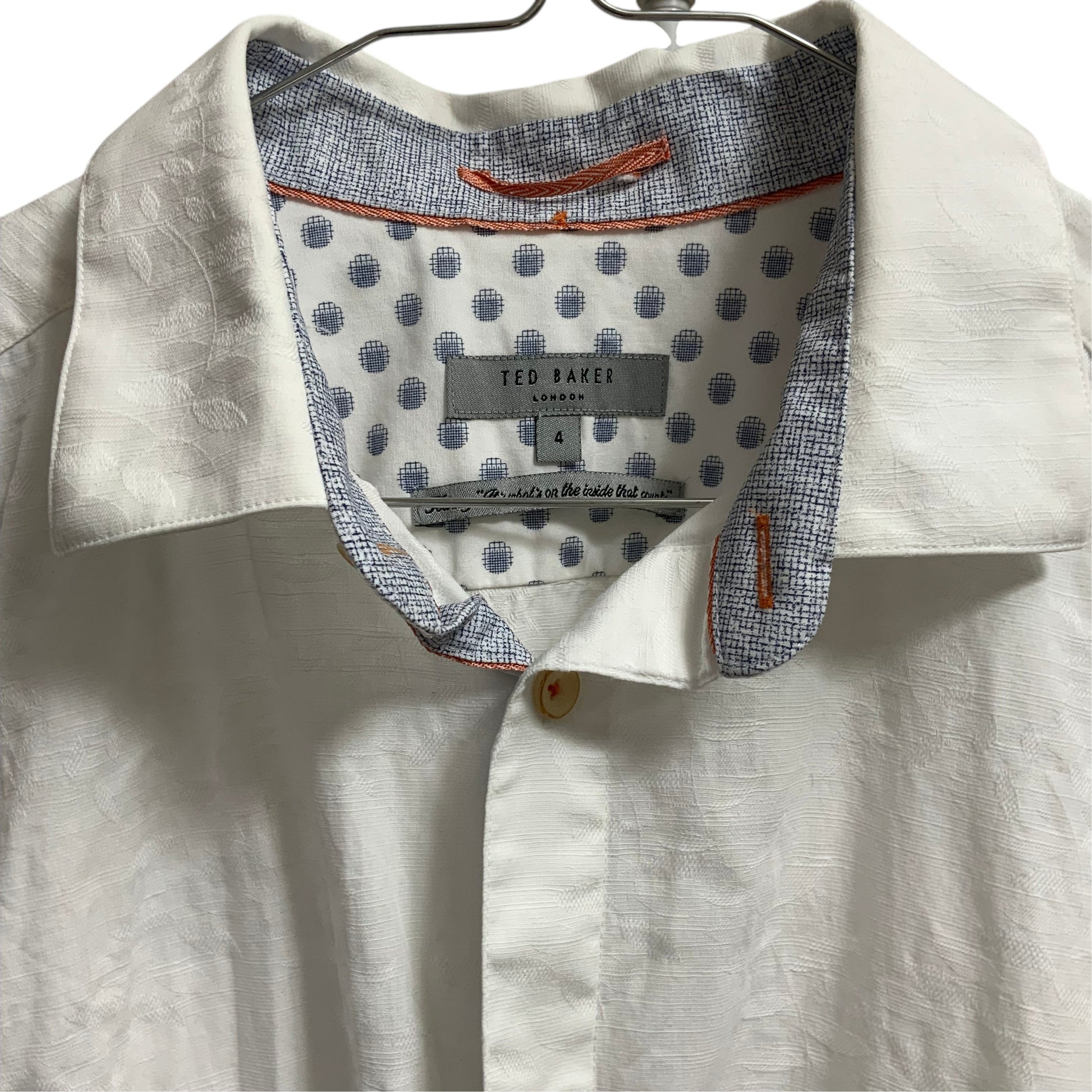 Amare Tutto Ted Baker London white cotton shirt featuring embossed leaf texture and blue and orange collar detail