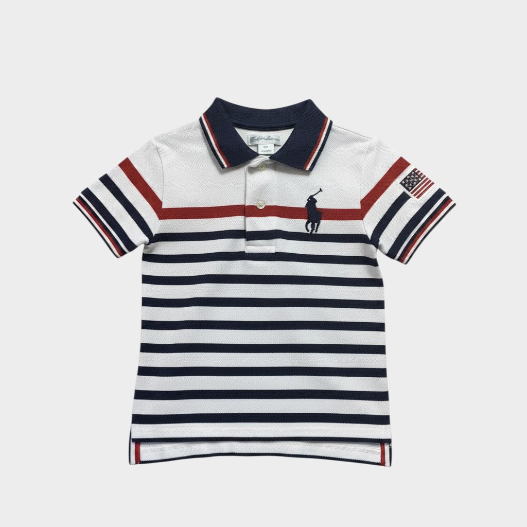 Amare Tutto white polo shirt for toddlers with navy and red stripes, USA flag patch, and embroidered logo